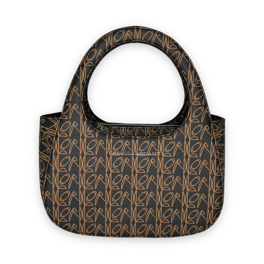 Luxury vegan leather Handbag crafted from with Camille Ardant’s signature Lord print. Zipper closure. The bag comes with two detachable crossbody straps: one chain detail strap and one adjustable shoulder strap. Silver hardware and twill fabric lining One interior zip pocket. One interior slip pocket Dimensions: 9.8” (25cm) Width x 4” (10cm) Depth x 6.7 (17cm) Height. Top handle 5” drop. Chain detail strap 23.5” (60cm) drop.
